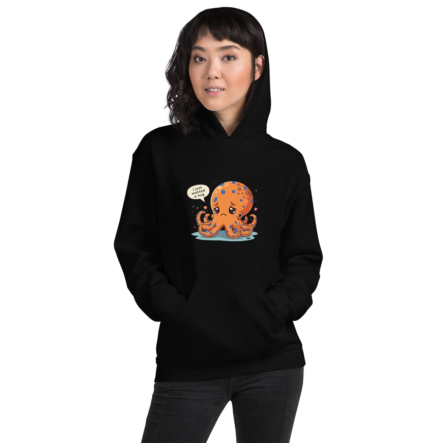 woman wearing a black hoodie with a blue ringed octopus design in the front