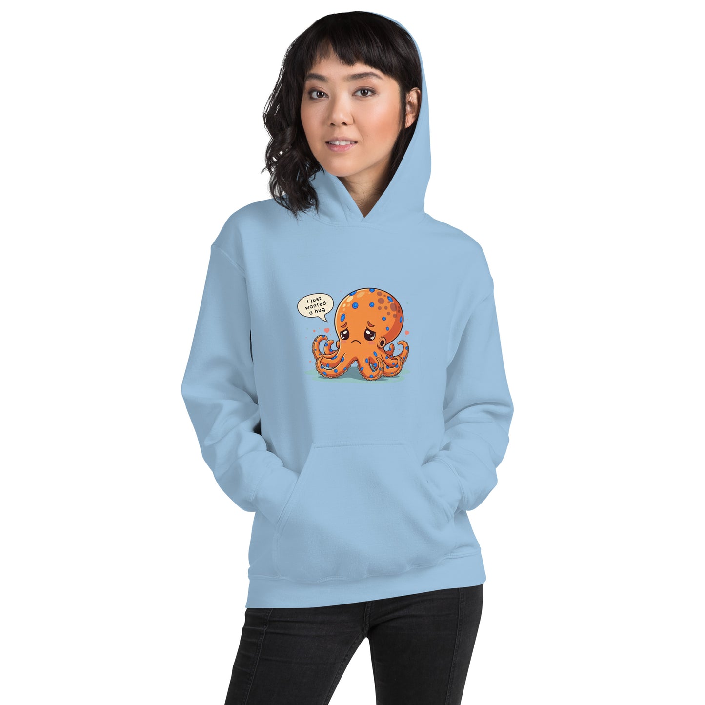 woman wearing a blue hoodie with a blue ringed octopus design in the front