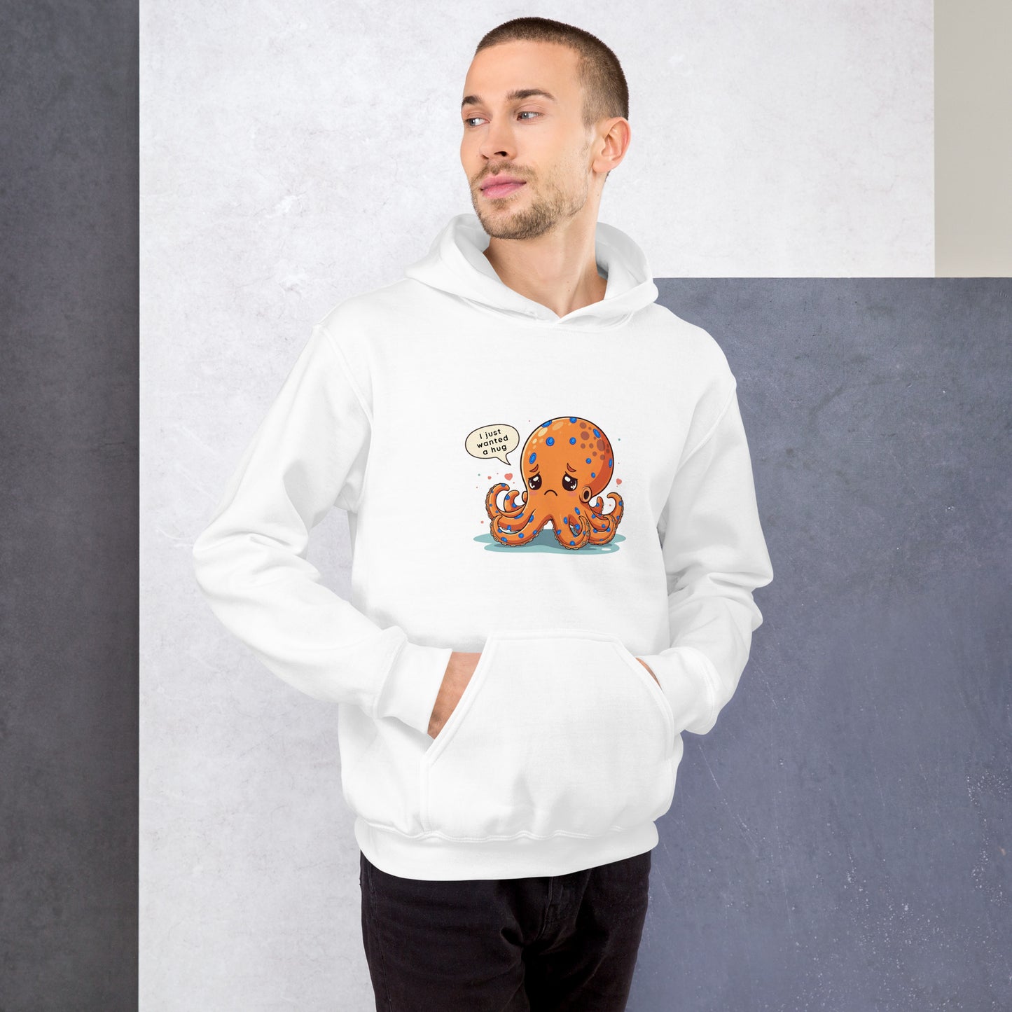 man wearing a white hoodie with a blue ringed octopus design in the front