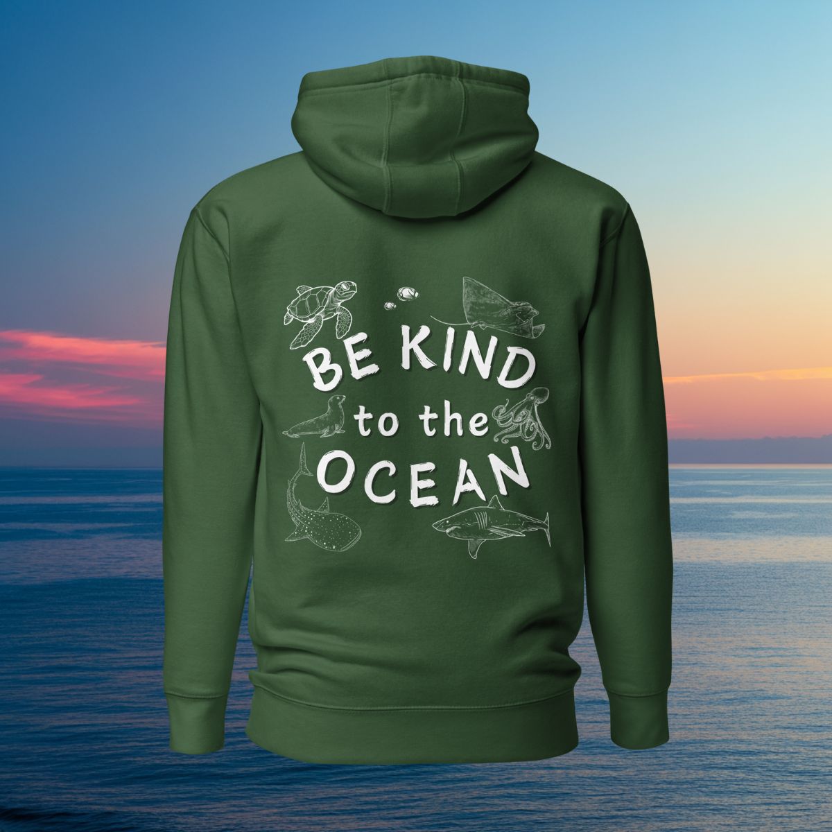 a green hoodie with the logo written be kind to the ocean with marine animals around it