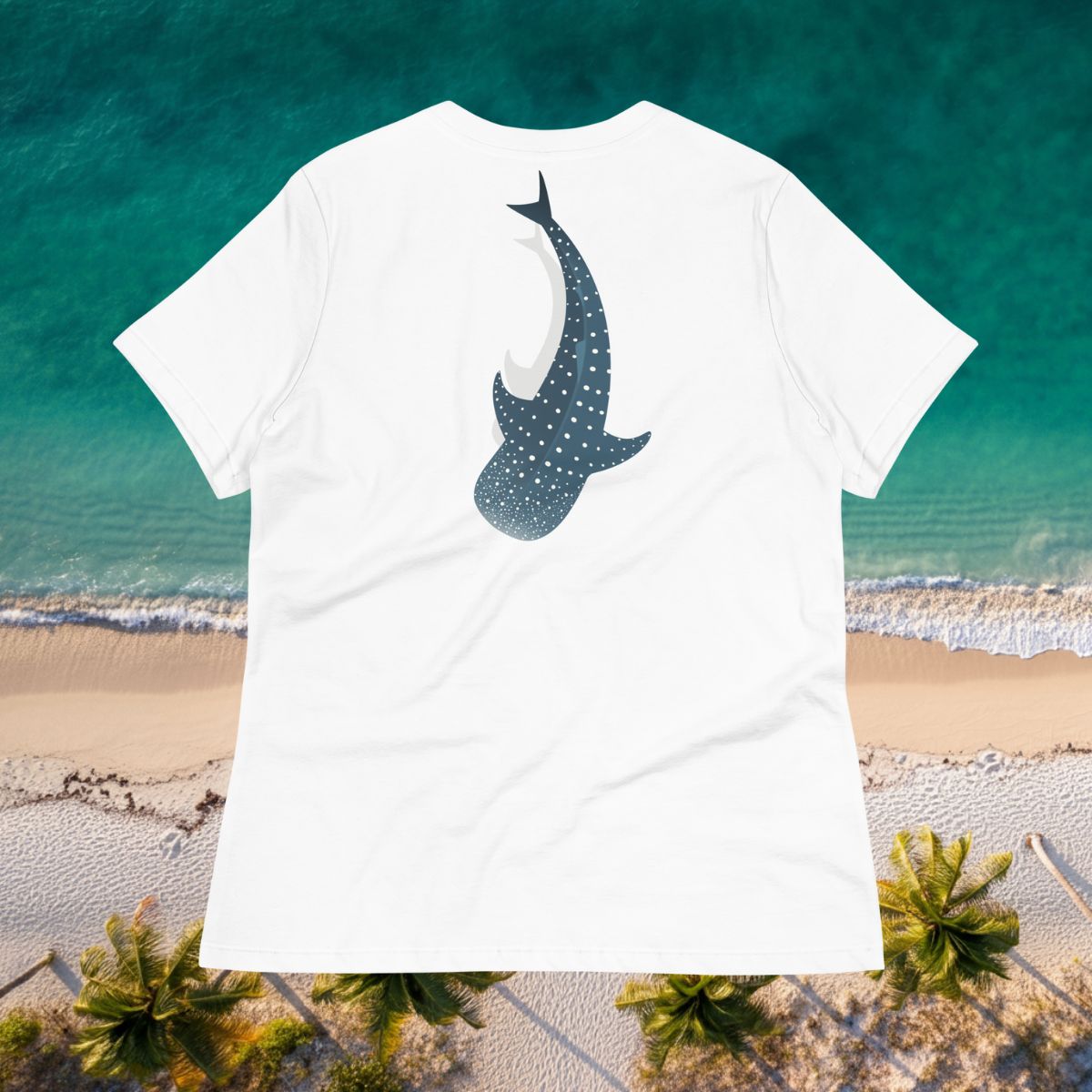 A white shirt with a large logo of a whale shark pointing down on the back side