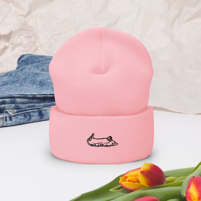 pink beanie with a black nudibranch embroidery logo