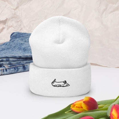 white beanie with a black nudibranch embroidery logo