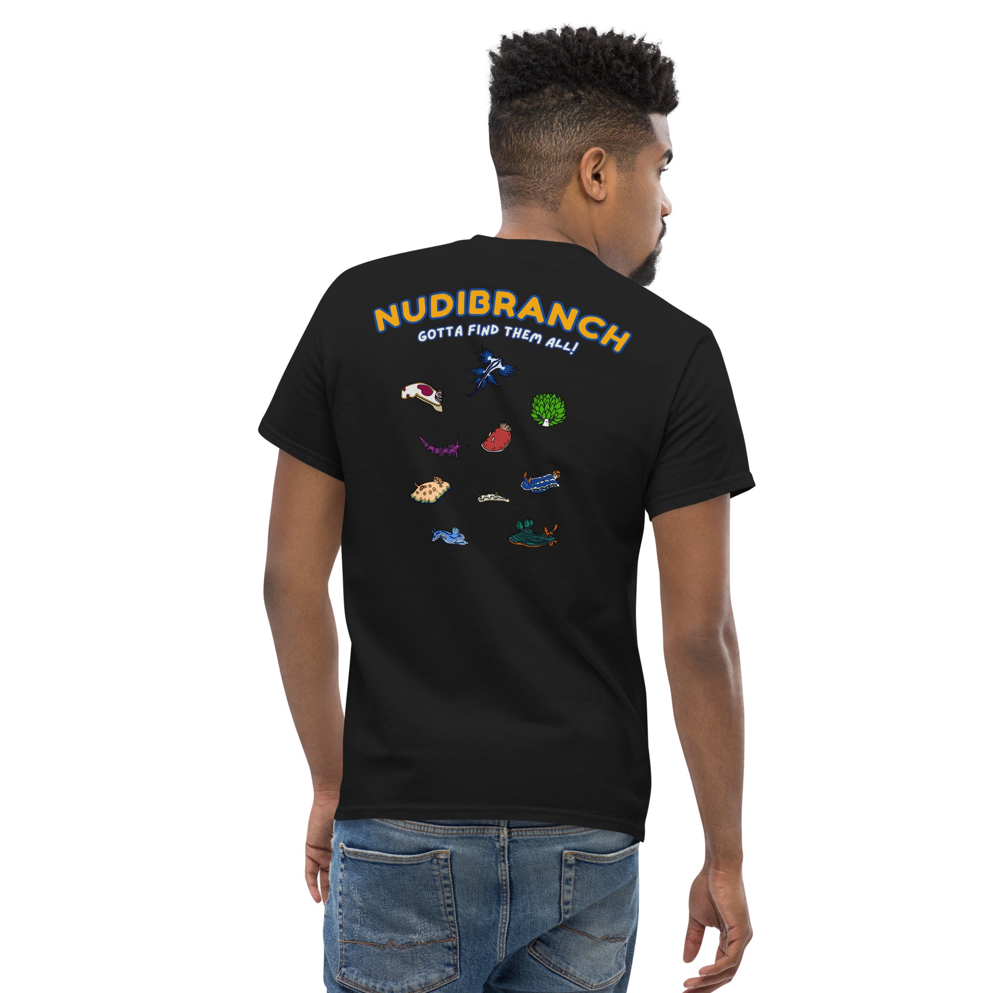 Man wearing a black t shirt with a logo of multiple colored nudibranch and written nudibranch in yellow and gotta find them all in white, back view