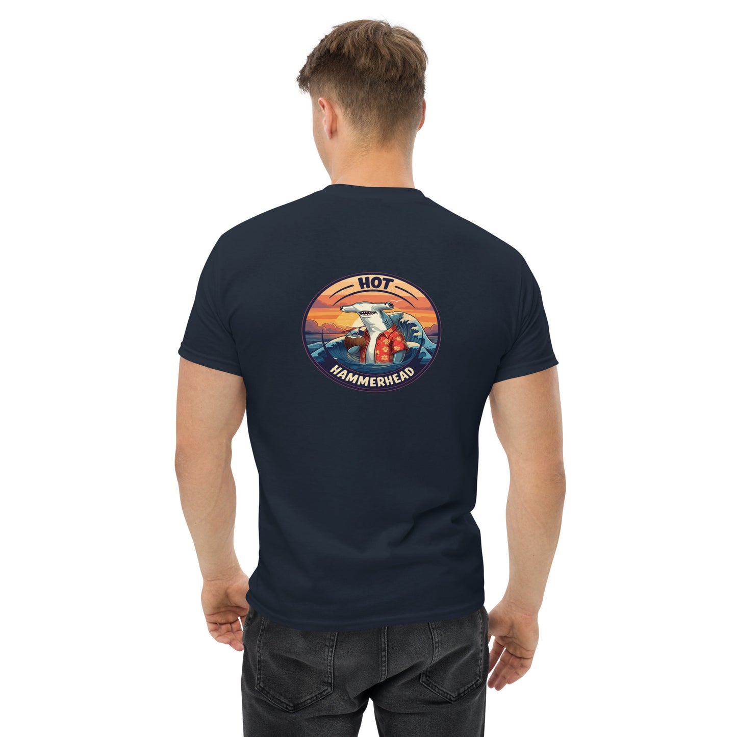 Man wearing a navy shirt with a hammerhead shark design on the back written hot hammerhead