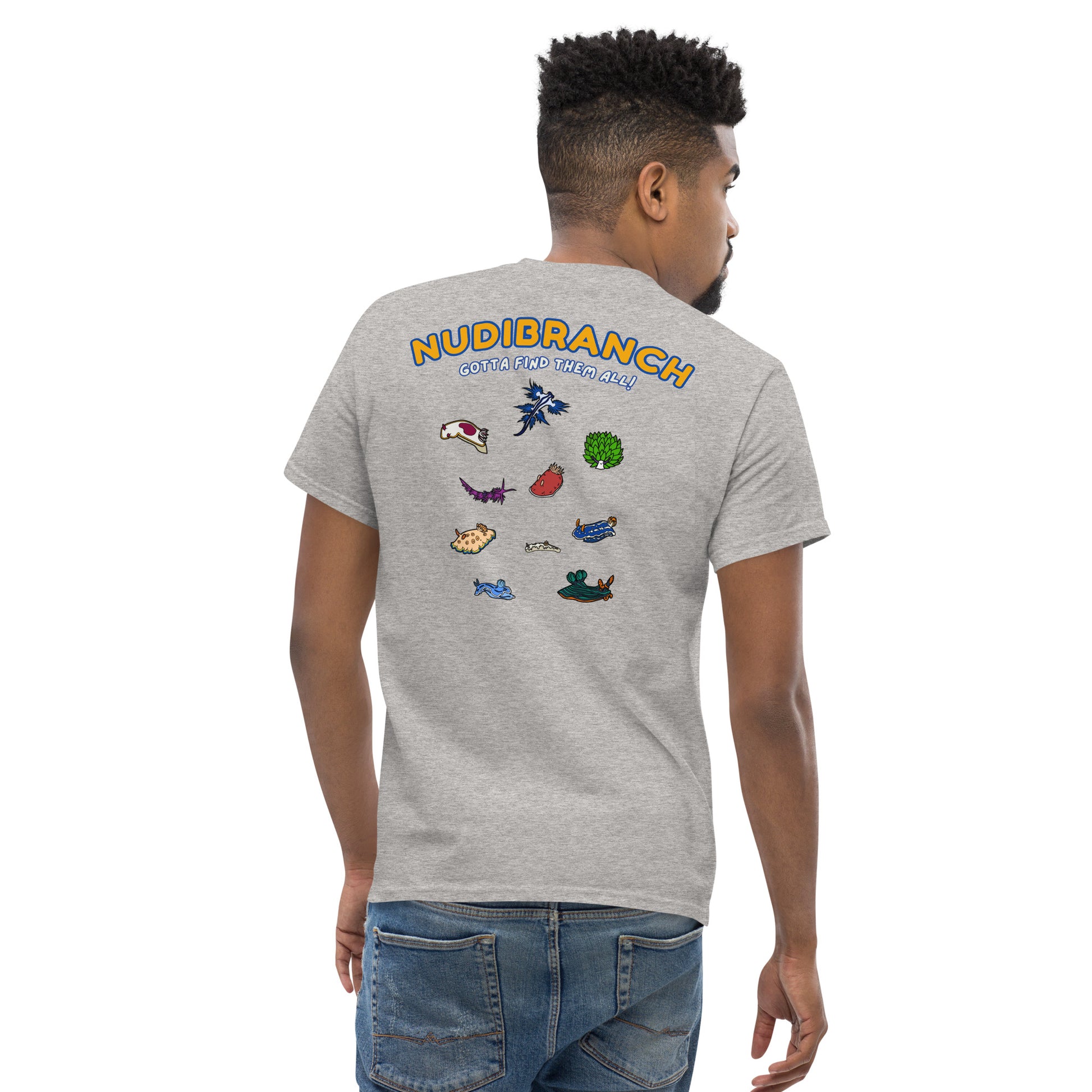 Man wearing a grey t shirt with a logo of multiple colored nudibranch and written nudibranch in yellow and gotta find them all in white, back view