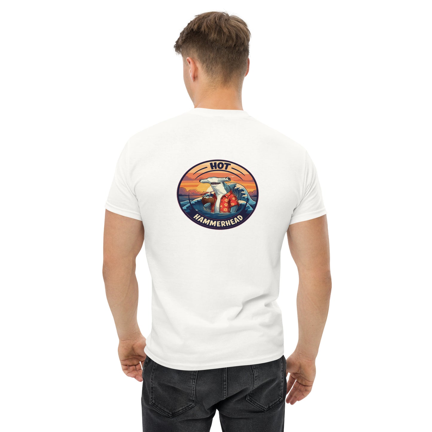 Man wearing a white shirt with a hammerhead shark design on the back written hot hammerhead